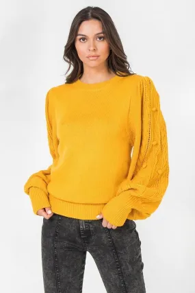 A Sweater Featuring Round Neckline, Puff Sleeves With Wide Cuffs