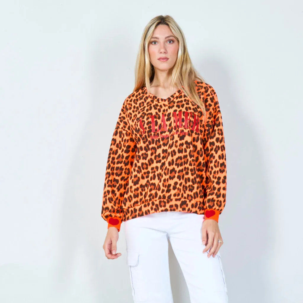 Bold leopard print "A LA MER" sweatshirt wholesale