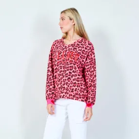 Bold leopard print "A LA MER" sweatshirt wholesale